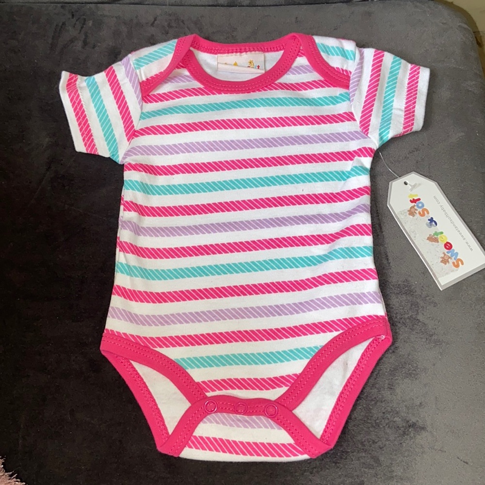 2 onesies both brand new one with tag
